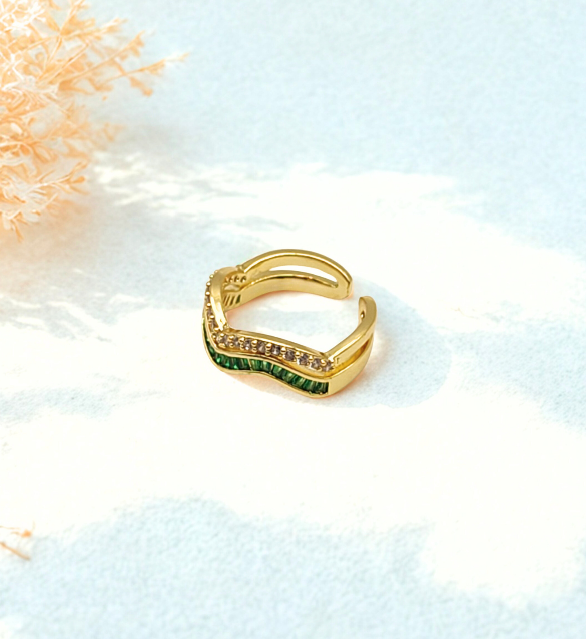 Gold Wave Design Ring with Emerald and Clear Stones