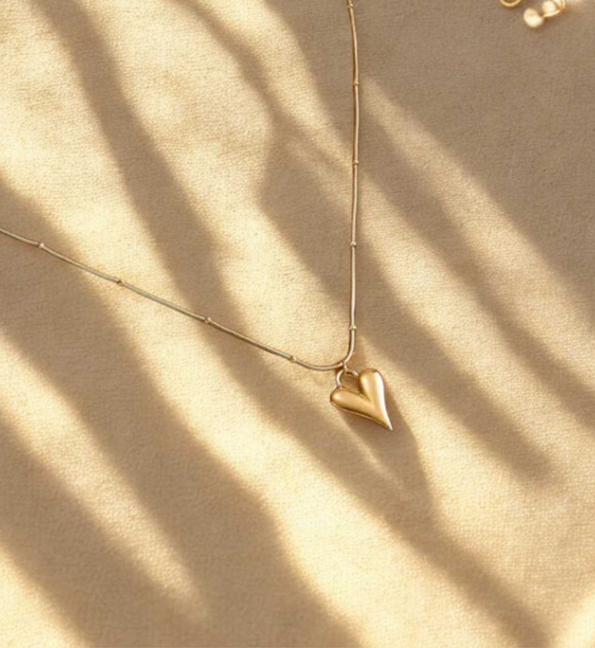 Long Heart Gold Pendant