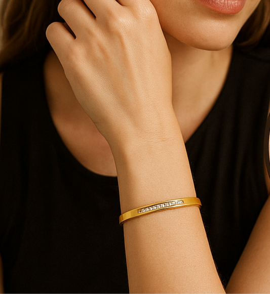 Sleek Gold Bangle with Crystal Accents