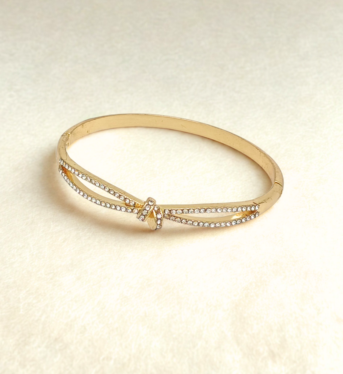 Gold Bow-Accented Bangle with Stones