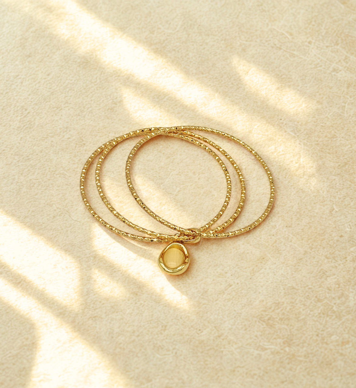 Gold Multi-Strand Bangle with Charm