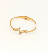 Gold Curved Bangle with Decorative Elements
