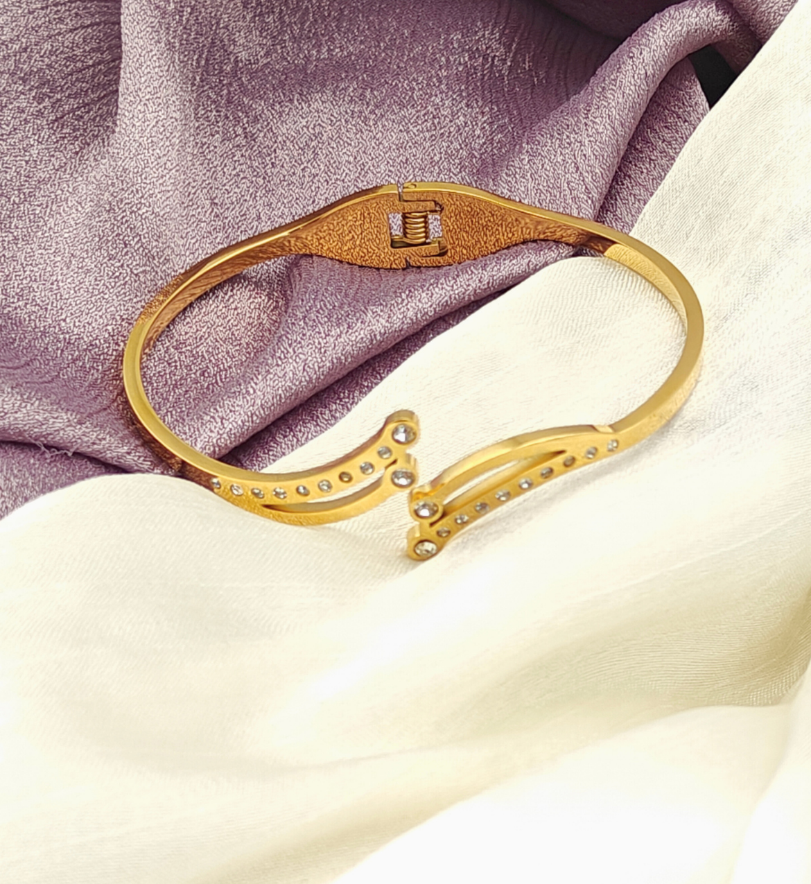 Gold Curved Bangle with Decorative Elements