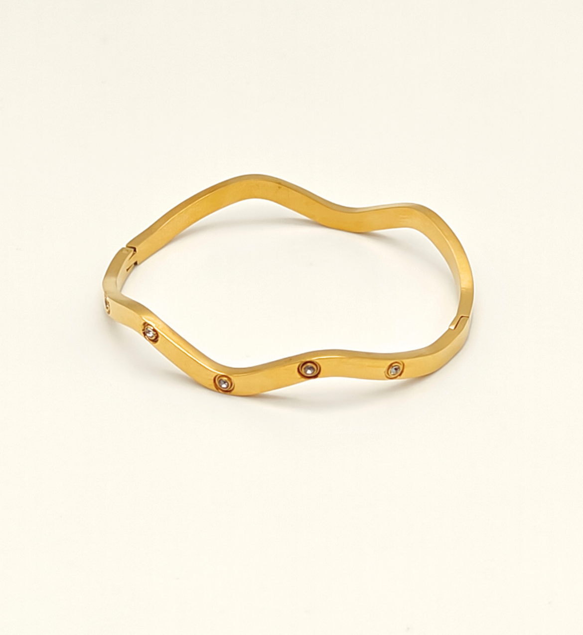 Gold Wavy Bangle with Stone Accents