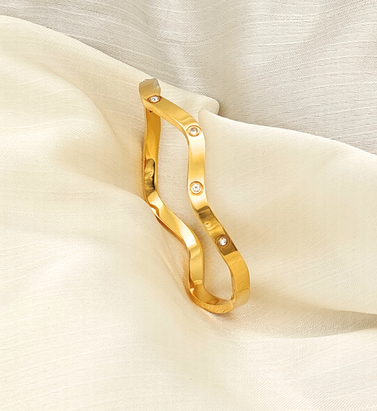 Gold Wavy Bangle with Stone Accents