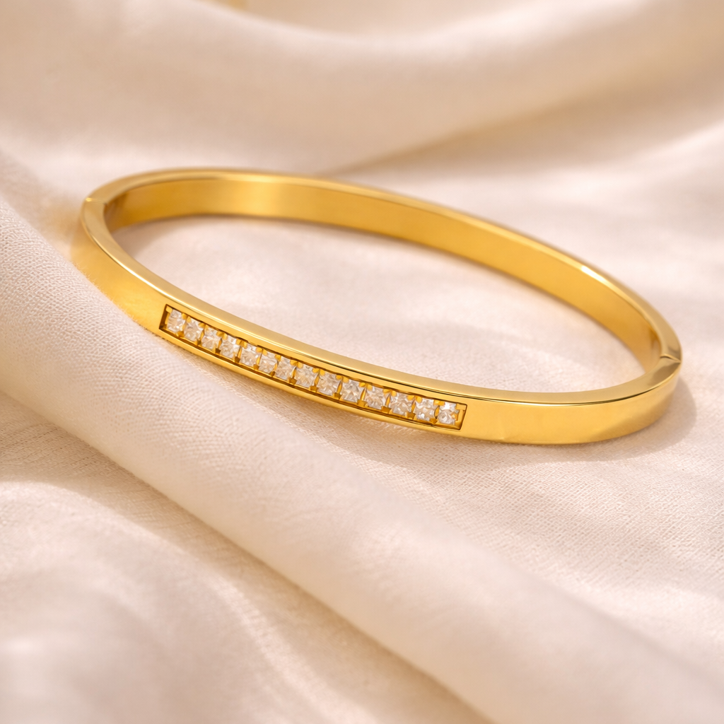 Sleek Gold Bangle with Crystal Accents