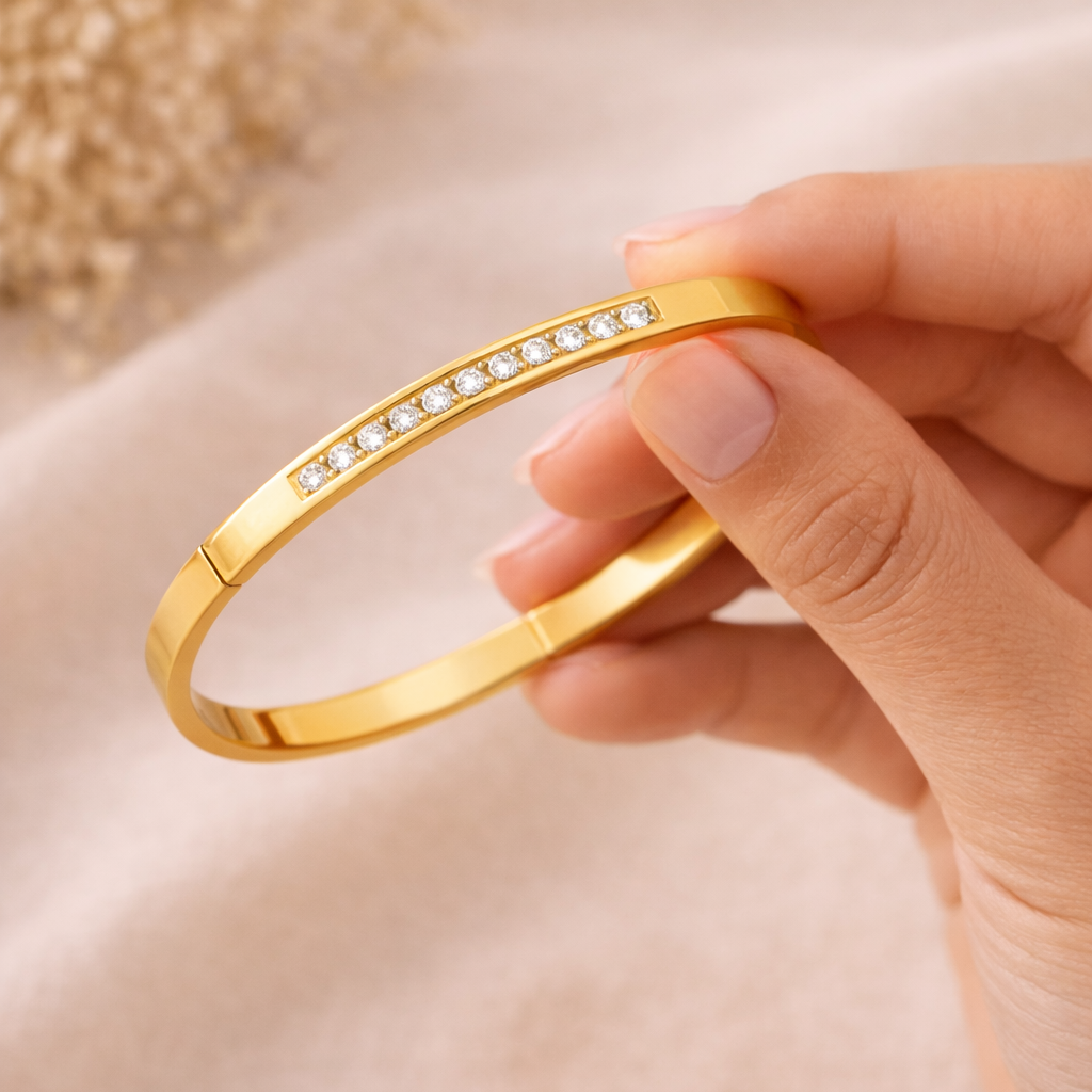 Sleek Gold Bangle with Crystal Accents