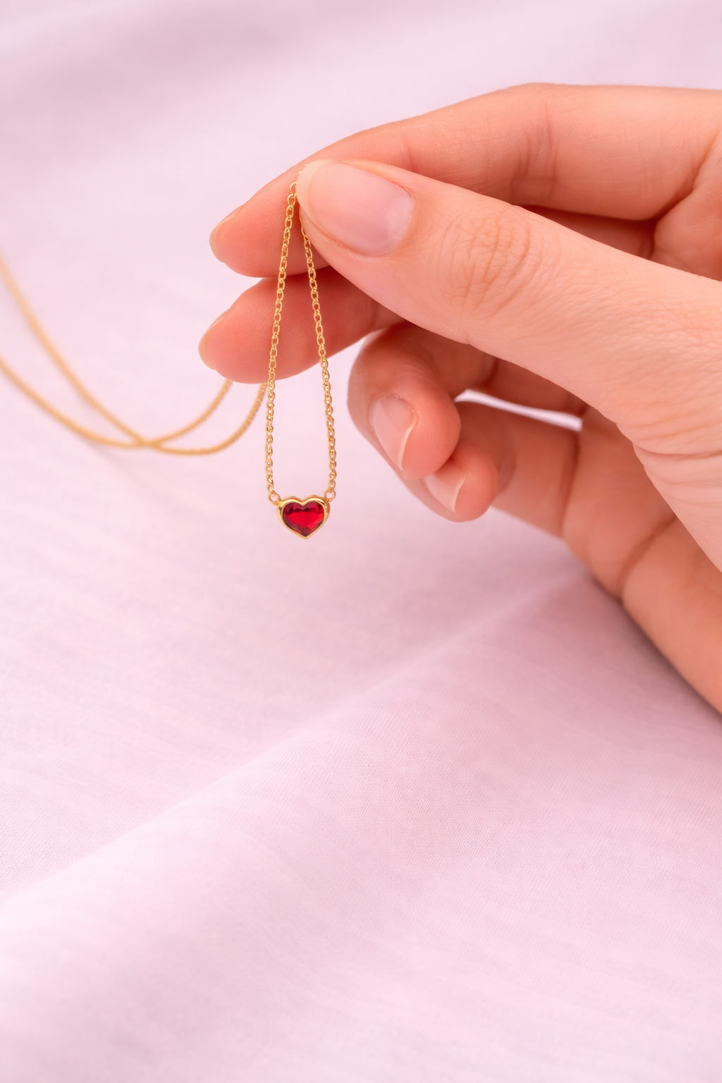 Gold Heart Pendant with Red Gemstone