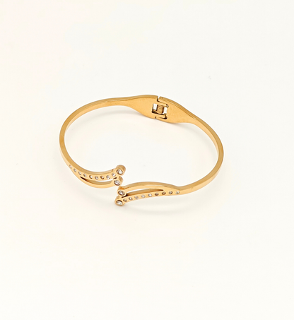 Gold Curved Bangle with Decorative Elements