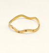 Gold Wavy Bangle with Stone Accents