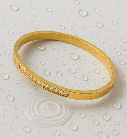 Sleek Gold Bangle with Crystal Accents